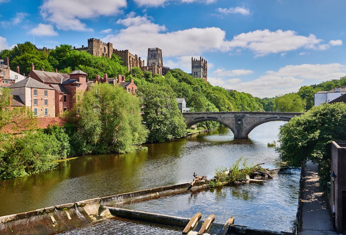 Durham Castle and Cathedral on the peninsula above Framwellgate Bridge and the River Wear
