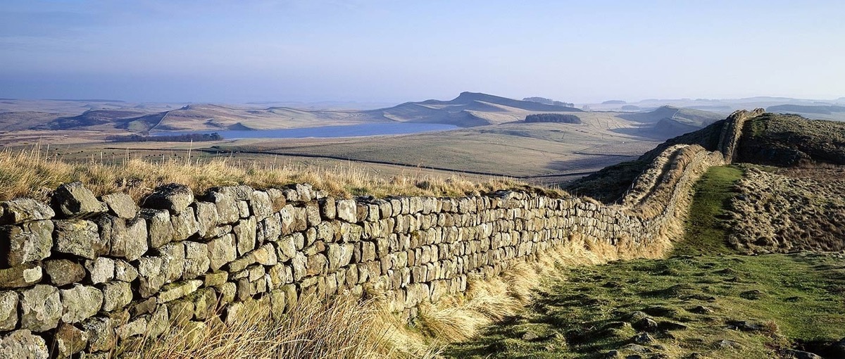 Hadrian's Wall running along a ridge across open moorland